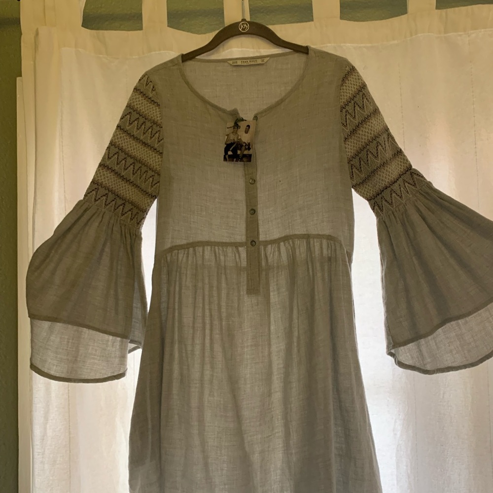 Zara brand Grey tunic dress. Size small.linen material with flared sleeve